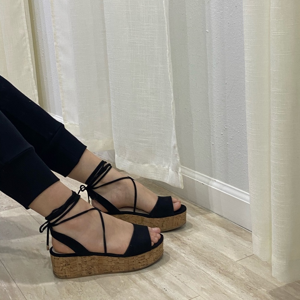 Black platform string sandals